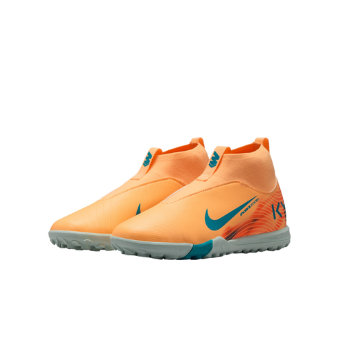 A pair of orange, laceless Nike Air Zoom soccer shoes with teal accents and KM branding, shown against a solid black background.