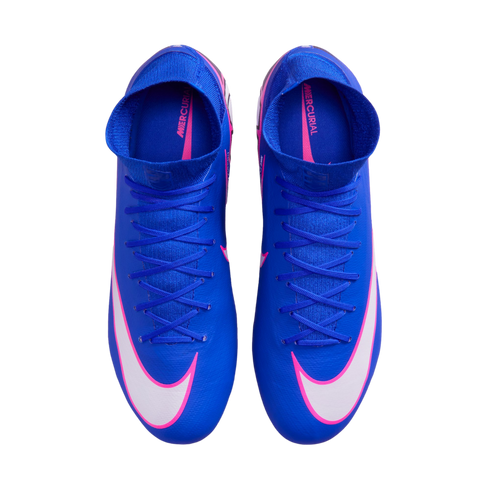 Top-down view of royal blue Nike Mercurial soccer cleats with white and pink swooshes, high-top collars, and blue laces on a black background.