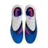 A top-down view of a pair of blue and white Nike Phantom soccer cleats with pink accents and black trim, set against a solid black background.