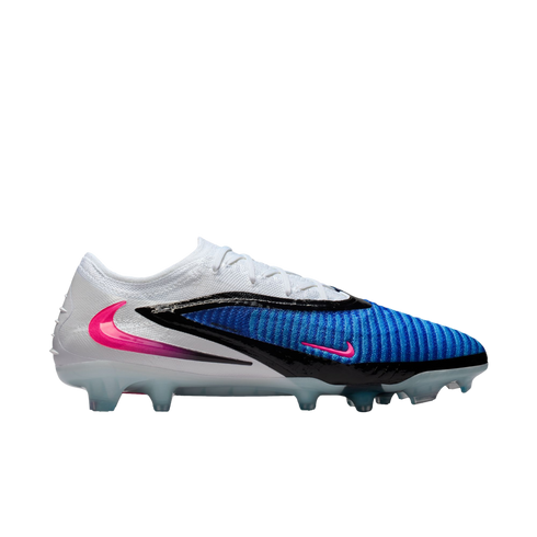 Profile view of a white, blue, and black Nike soccer cleat with pink accents, set against a solid black background.