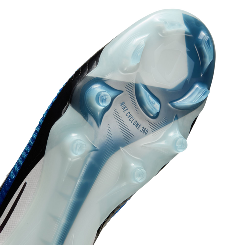 Close-up of the translucent blue and white sole plate of a Nike soccer cleat with "NIKE CYCLONE 360" branding and integrated studs.