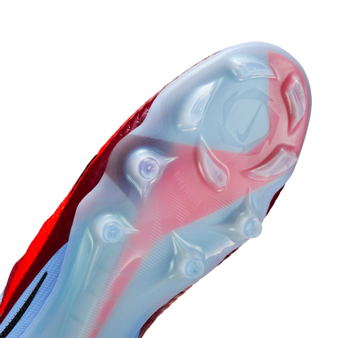 A close-up of a Nike soccer cleat's translucent soleplate with a red swoosh, showing the traction pattern and "NIKE CYCLONE 360" text against a black background.