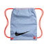 A light blue Nike drawstring bag with orange cords, featuring a large black swoosh and a repeating text pattern of "Nike Soccer" in several languages.