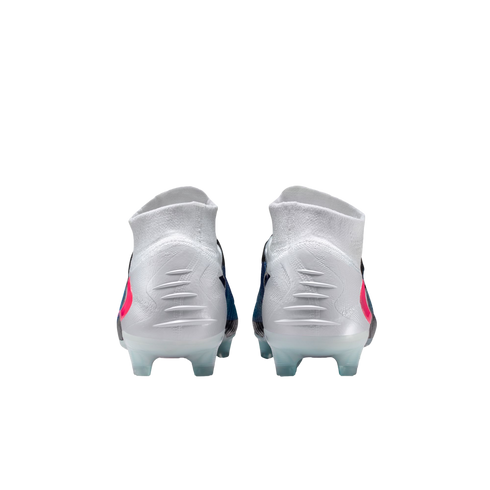 Rear view of white high-top soccer cleats with pink and blue accents and ribbed heels on a black background.