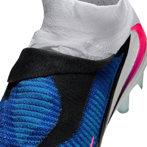 Close-up of a blue, black, and white Nike soccer cleat featuring a textured upper and a knit ankle collar.