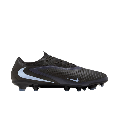 Side profile of a black Nike Phantom Venom soccer cleat with light blue swooshes and a textured upper, set against a black background.