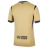 Back view of a gold sports jersey with blue and black striped trim, a small flag at the neck, and a black UNHCR ACNUR logo on the lower back.