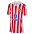 Atlético de Madrid home soccer jersey with red and white vertical stripes, featuring the club crest, Nike swoosh, and Riyadh Air sponsor logo on the front.