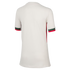 Back view of a cream short-sleeved soccer jersey with green and red striped sleeve cuffs and a red side stripe.