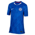 Royal blue Nike Chelsea FC home soccer jersey with a subtle geometric pattern, white team crest, white swoosh, and a white and red trimmed V-neck collar.