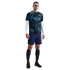 Male athlete standing in a black and blue Inter Milan kit, white compression sleeves, navy shorts, and black socks against a plain white background.