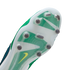 Close-up bottom view of a Nike soccer cleat featuring a translucent soleplate with green and white designs, metal-tipped studs, and a small yellow swoosh logo.