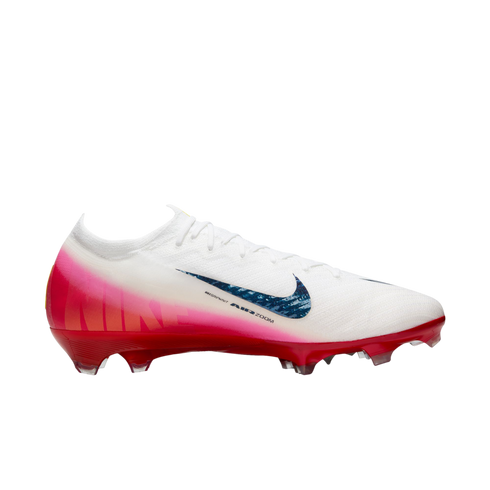 A white Nike soccer cleat with a pink and red gradient base, featuring a blue textured swoosh and "AIR ZOOM" text on the side.