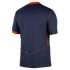 Back view of a navy blue short-sleeved sports jersey with bright orange piping along the shoulders, sleeve cuffs, and lower back.