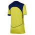 Rear view of a short-sleeved yellow athletic jersey featuring navy blue upper panels and V-shaped navy piping on the lower back.