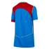 Back view of a blue soccer jersey with a large red upper panel, white piping accents, and a white collar.