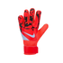 A red and black Nike goalkeeper glove featuring a geometric pattern on the fingers and a white swoosh logo, displayed against a solid black background.