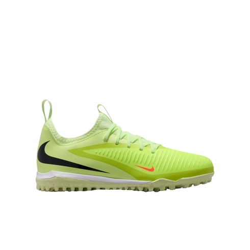 Side view of a lime green Nike turf soccer shoe with a black swoosh and a small orange swoosh, isolated on a black background.