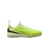 Side view of a lime green Nike turf soccer shoe with a black swoosh and a small orange swoosh, isolated on a black background.