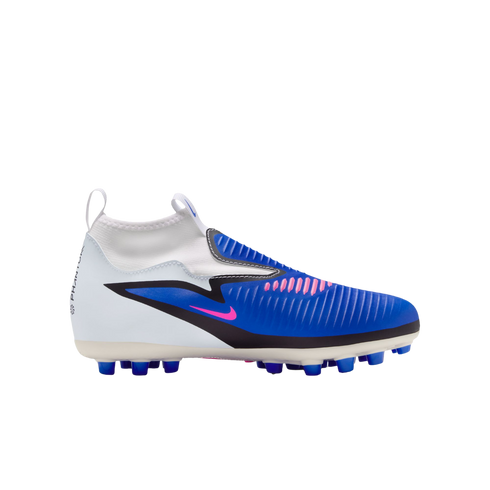 Side view of a white and blue laceless Nike Phantom soccer cleat with pink accents, featuring a sock-like collar and blue studs against a black background.