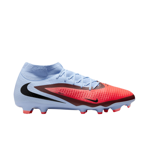 A light blue and bright red Nike soccer cleat with a sock-like collar, shown in profile against a black background.