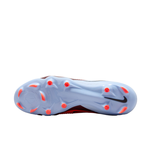 Underside of a light blue Nike soccer cleat with bright orange studs and "NIKE CYCLONE 360" branding on the soleplate.