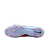 Underside of a light blue Nike soccer cleat with bright orange studs and "NIKE CYCLONE 360" branding on the soleplate.
