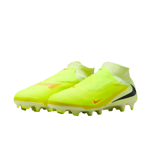 A pair of neon yellow laceless Nike soccer cleats with orange swooshes against a black background.