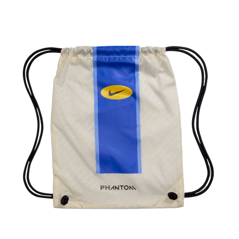 Off-white Nike Phantom drawstring bag featuring a central blue stripe with a yellow logo and "PHANTOM" text at the bottom.