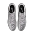 A top-down view of a pair of metallic silver Nike Tiempo Ligera soccer shoes with white laces and black insoles, set against a solid black background.