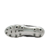 A bottom-up view of the silver soleplate of a Nike soccer cleat with black studs, shown against a solid black background.