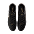 Top-down view of black Nike Tiempo Ligera soccer cleats with gold accents and branding, shown against a solid black background.