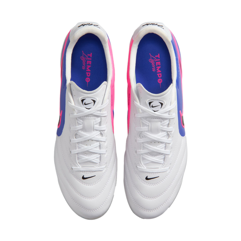 Top-down view of a pair of white Nike Tiempo Ligera soccer cleats with pink and blue side accents and blue insoles.