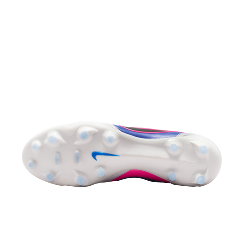 Underside of a white Nike soccer cleat featuring a blue swoosh and clear studs against a solid black background. Pink and blue accents are visible on the upper.