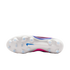 Underside of a white Nike soccer cleat featuring a blue swoosh and clear studs against a solid black background. Pink and blue accents are visible on the upper.