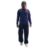 Man in a navy Nike FC Barcelona sweatshirt with orange accents and matching track pants, standing against a black background.