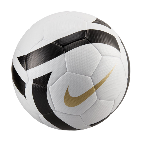 A white Nike soccer ball with bold black graphic patterns and a metallic gold swoosh logo, isolated on a black background.
