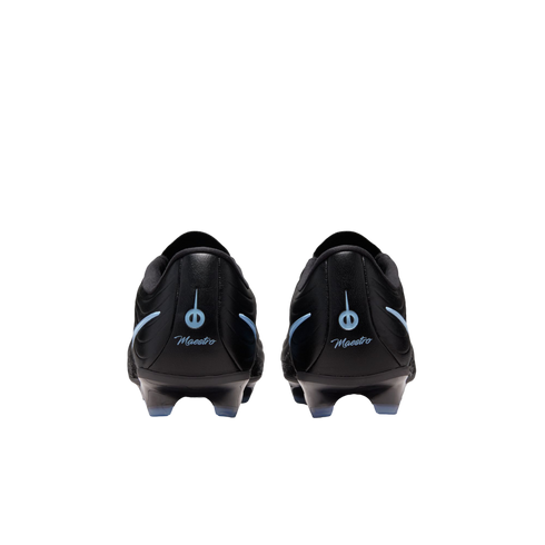 Rear view of two black soccer cleats with light blue "Maestro" script and circular logos on the heels, set against a solid black background.