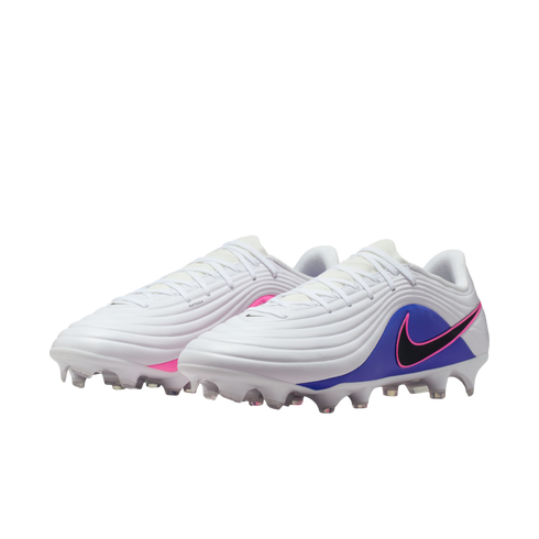 A pair of white Nike soccer cleats with purple and pink accents and a black swoosh, isolated against a black background.