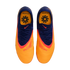 Top-down view of orange and navy blue Nike Phantom soccer cleats with red accents, displayed on a black background.