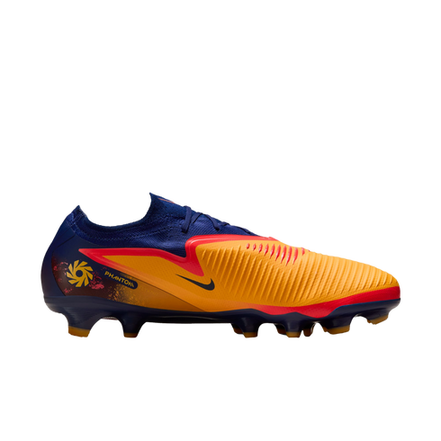 Profile view of a blue and orange Nike Phantom soccer cleat with red accents, displayed against a solid black background.