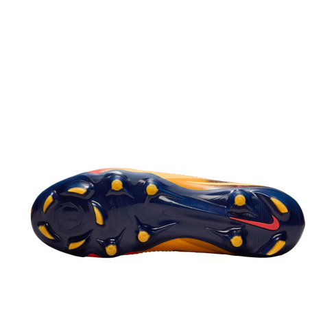The dark blue soleplate of a Nike soccer cleat featuring yellow conical and bladed studs, with a circular traction pattern at the forefoot, set against a black background.
