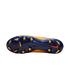The dark blue soleplate of a Nike soccer cleat featuring yellow conical and bladed studs, with a circular traction pattern at the forefoot, set against a black background.