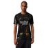 A man models a black Paris Saint-Germain soccer jersey featuring a gold and green marbled pattern. The jersey displays a silver Jordan Jumpman logo, the club crest, and "QATAR AIRWAYS" in white across the chest. He is standing against a solid black backgr