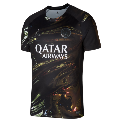 A short-sleeved Paris Saint-Germain soccer jersey by Jordan, featuring a black base with a swirling gold and brown marbled pattern, a white Qatar Airways sponsor logo, and silver team and brand logos.