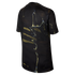 Rear view of a black short-sleeved t-shirt featuring an abstract gold and yellow liquid marble pattern.