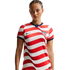 A woman wearing a red and white striped USA national soccer team jersey with a navy blue collar, set against a solid black background.