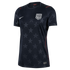 Navy blue Nike USA soccer jersey with a subtle star pattern, white team crest, and thin red accents on the shoulders and sides.