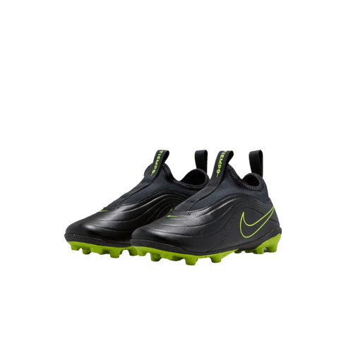 A pair of black, laceless Nike Tiempo soccer cleats with neon green accents, including the Nike swoosh and studded outsole, displayed against a black background.