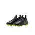 A pair of black, laceless Nike Tiempo soccer cleats with neon green accents, including the Nike swoosh and studded outsole, displayed against a black background.
